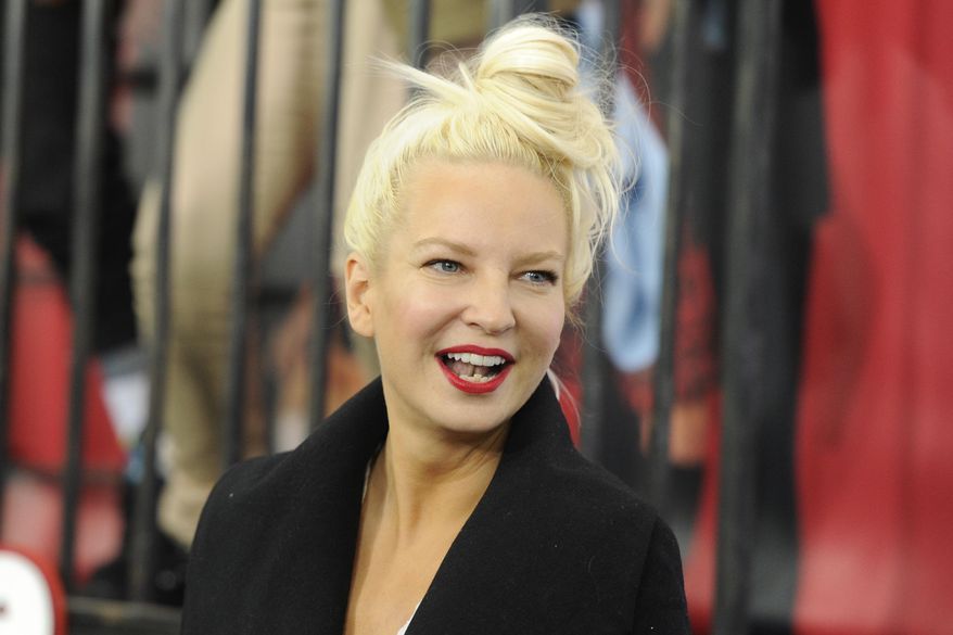 FILE - Singer Sia Furler attends the world premiere of "Annie" in New York on Dec. 7, 2014. (Photo by Evan Agostini/Invision/AP, File)