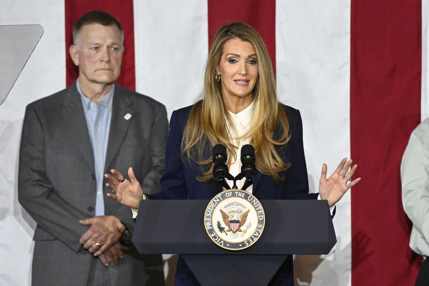Administrator of the Small Business Administration Kelly Loeffler, right, speaks at a rally before Vice President J.D. Vance (not shown) speaks about "America's industrial resurgence," Friday, March 14, 2025, at Vantage Plastics in Bay City, Mich. At left is Vantage Plastics President Paul Aultman. (AP Photo/Jose Juarez, File)
