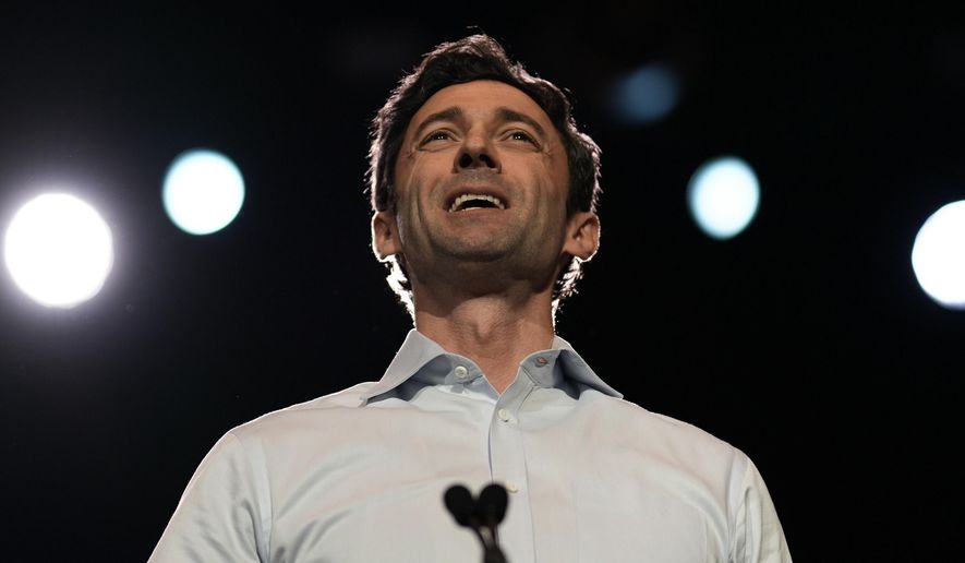U.S. Sen. Jon Ossoff, D-Ga., speaks during a Rally for our Republic gathering, Saturday, March 22, 2025, in Atlanta. (AP Photo/Mike Stewart)