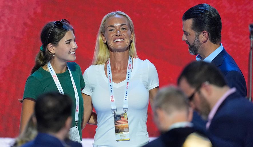 Vanessa Trump, center, ex-wife of Donald Trump Jr., right, and their daughter Kai Madison, left, on stage during the third day of the Republican National Convention on Wednesday, July 17, 2024, in Milwaukee. (AP Photo/J. Scott Applewhite,File)