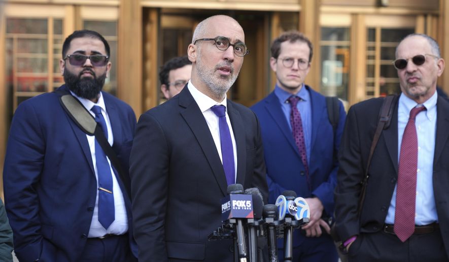 Ramzi Kassem, third from right, a lawyer representing Yunseo Chung, talks to reporters outside a federal courthouse in New York, Tuesday, March 25, 2025. (AP Photo/Seth Wenig)