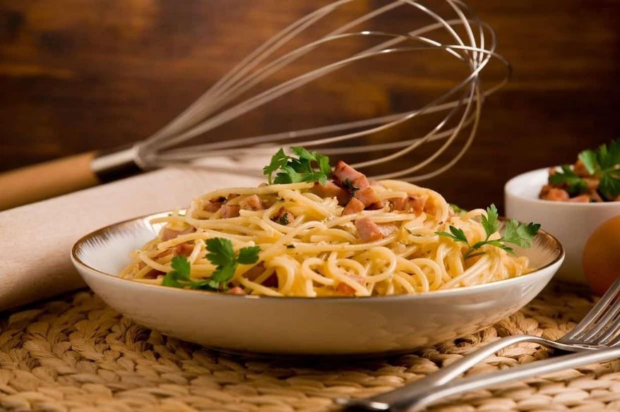 Chefs debate which Roman pasta dish reigns supreme. From carbonara to gricia, here's what makes each one unique and authentic. Photo credit: Depositphotos.