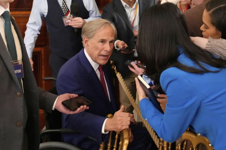 Texas Gov. Greg Abbott speaks with reporters after President Donald Trump spoke at an education event and executive order signing in the East Room of the White House in Washington, Thursday, March 20, 2025. (AP Photo/Ben Curtis)