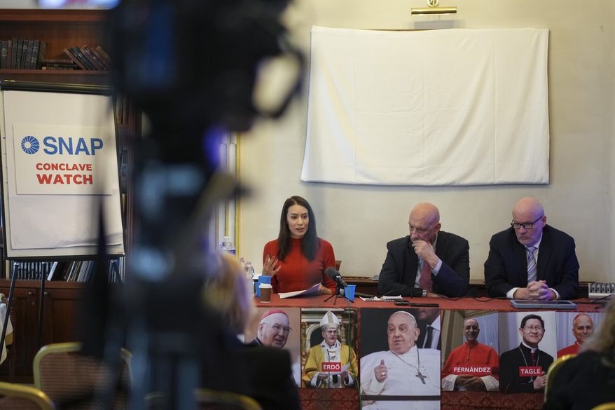 From left, SNAP, Survivors Network of those Abused by Priests, activists Sarah Pearson, Peter Isely and president Shaun Dougherty talk to reporters during a press conference, in Rome, Tuesday, March 25, 2025. (AP Photo/Andrew Medichini)