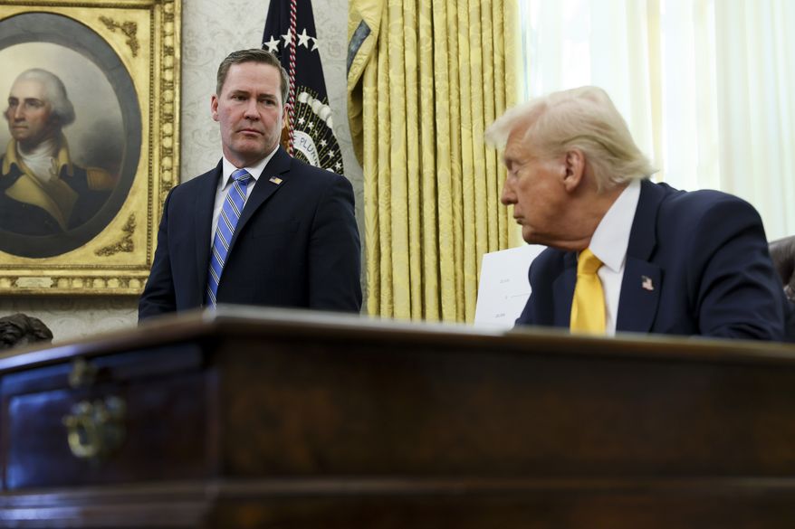 White House national security adviser Mike Waltz listens as President Donald Trump speaks in the Oval Office of the White House in Washington, Friday, March 7, 2025. (Pool via AP) **FILE**