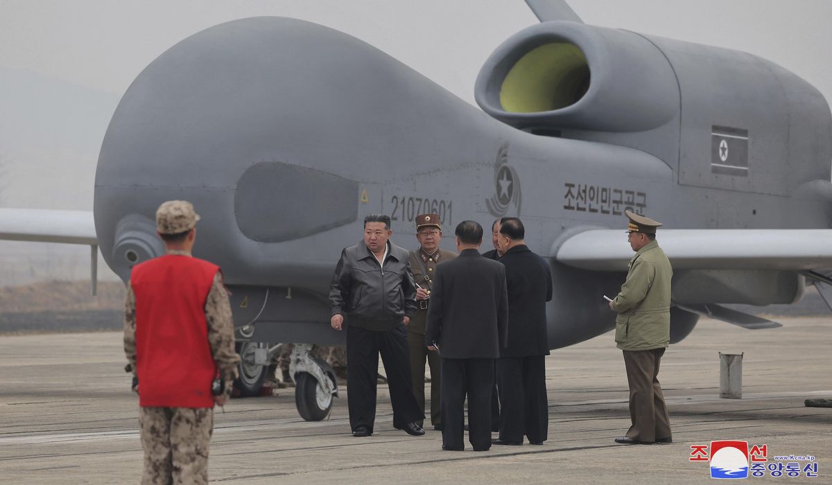 NextImg:North Korea’s Kim supervises AI-enabled drone strike tests from high-tech plane