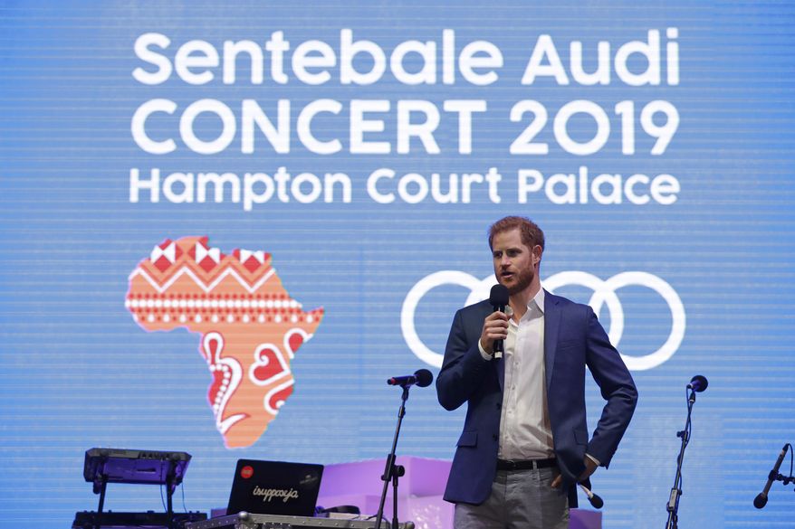 FILE - Britain's Prince Harry speaks on stage during a concert hosted by his charity Sentebale to raise funds and awareness to support children and young people affected by HIV and AIDS in Lesotho, Botswana and Malawi, at Hampton Court Palace, in London, Tuesday June 11, 2019. (AP Photo/Matt Dunham, Pool, File)