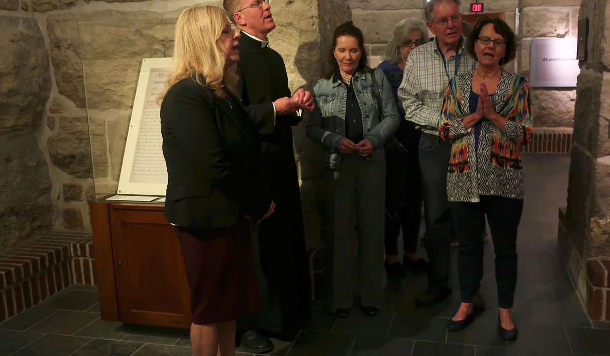 NextImg:Satanist leader’s attempt to hold Black Mass in Kansas Statehouse sparks chaos and 4 arrests