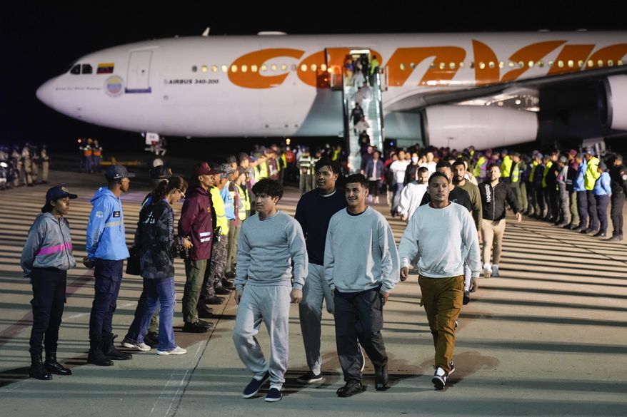 Venezuelan migrants deported from the United States arrive at Simon Bolivar International Airport in Maiquetia, Venezuela, Monday, March 24, 2025. (AP Photo/Ariana Cubillos)