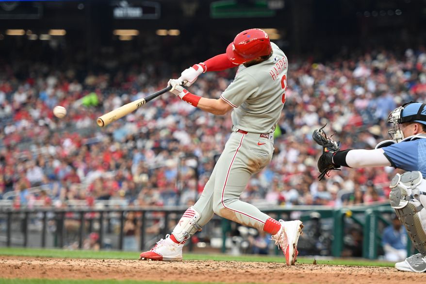 Philadelphia Phillies first baseman Bryce Harper (3) hitting a single during the eighth inning of an MLB game against the Washington Nationals at Nationals Park in Washington D.C., March 29, 2025. (Photo by All-Pro Reels for Washington Times Sports)