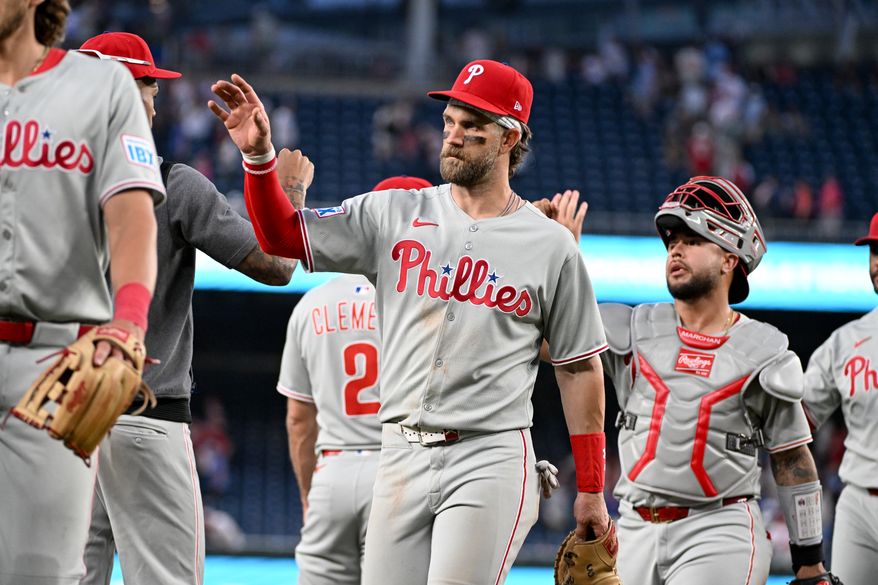 Philadelphia Phillies first baseman Bryce Harper (3) congratulating teammates after the team’s 11-6 win over the Washington Nationals at Nationals Park in Washington D.C., March 29, 2025. (Photo by All-Pro Reels for Washington Times Sports)