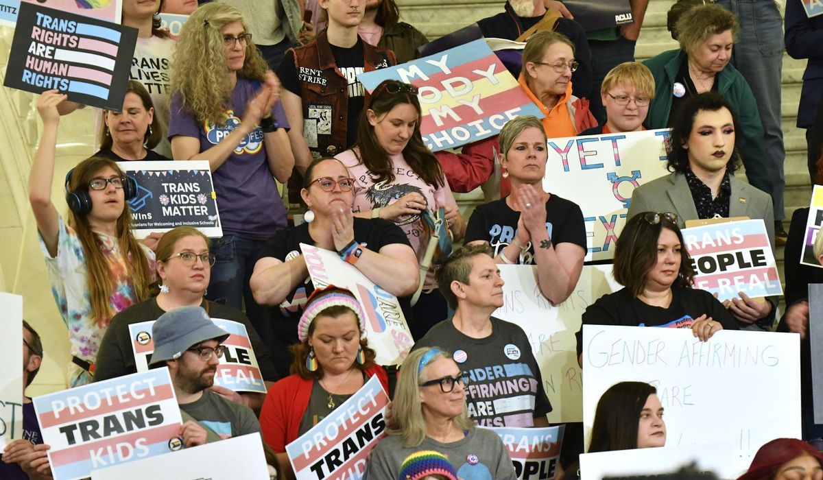 NextImg:Judge blocks Trump administration from passport changes affecting transgender Americans