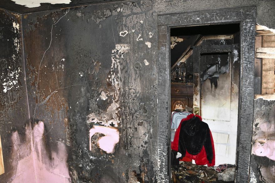 This image provided by the Waterbury Police Department shows the home where a Connecticut man told authorities his stepmother held him captive for two decades since he was a boy. (Waterbury Police Department via AP)