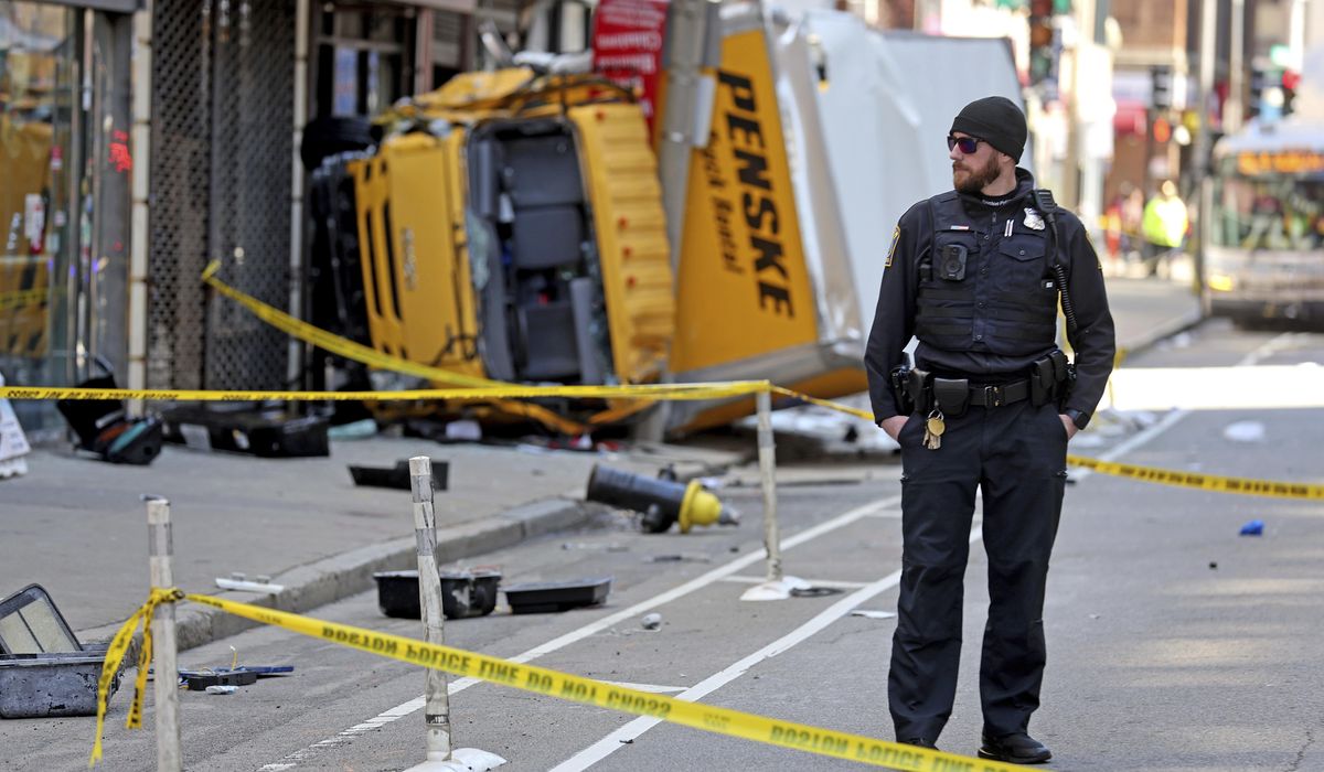 NextImg:At least 6 people are injured after a truck crashed into a building and pedestrians in Boston