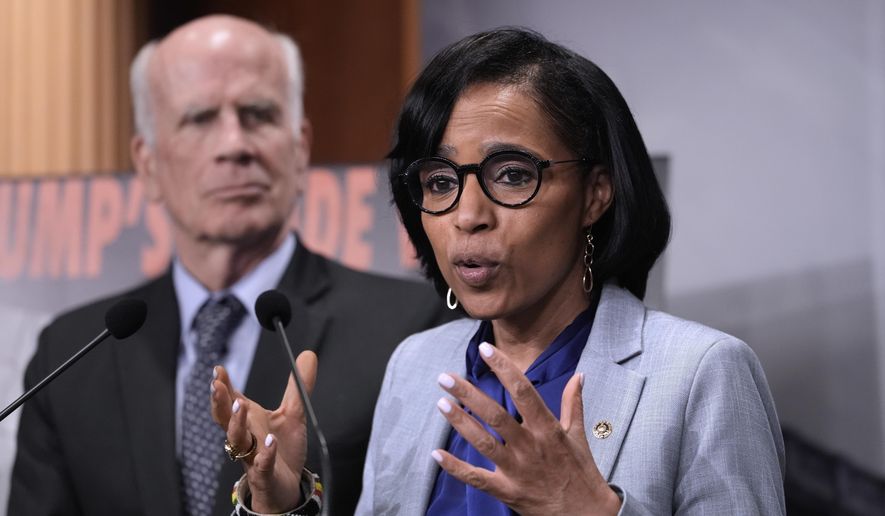 Sen. Angela Alsobrooks, D-Md., joined at left by Sen. Peter Welch, D-Vt., speaks to reporters about President Donald Trump's tariffs on foreign countries, at the U.S. Capitol in Washington, Wednesday, April 2, 2025. (AP Photo/J. Scott Applewhite) ** FILE **