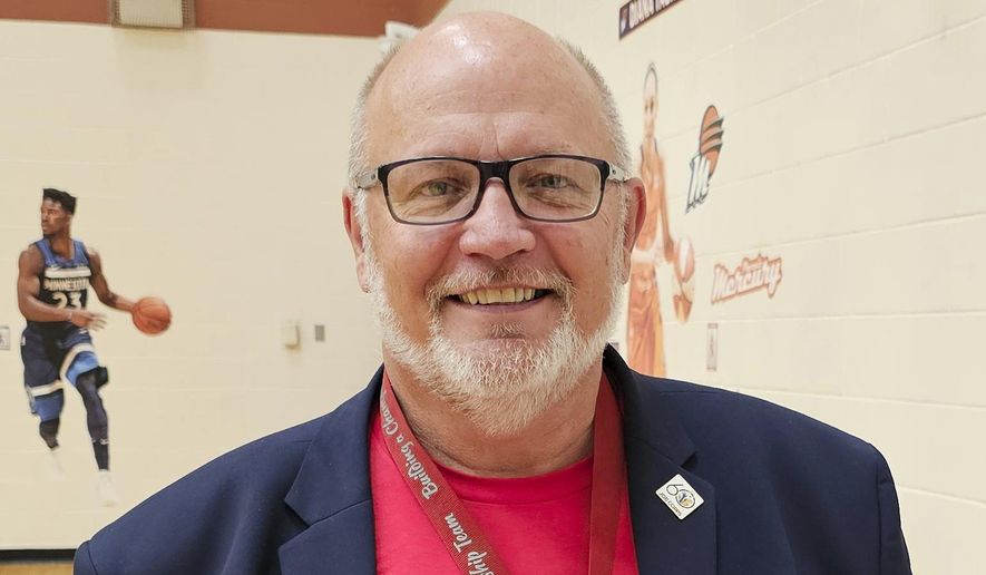 Tom Ross, mayor of Minot, N.D., one of North Dakota's largest cities, is photographed in August 2024. On Tuesday, April 1, 2025, Ross resigned after an investigation into him mistakenly sending a lewd video to the city attorney. (Minot Daily News via AP)