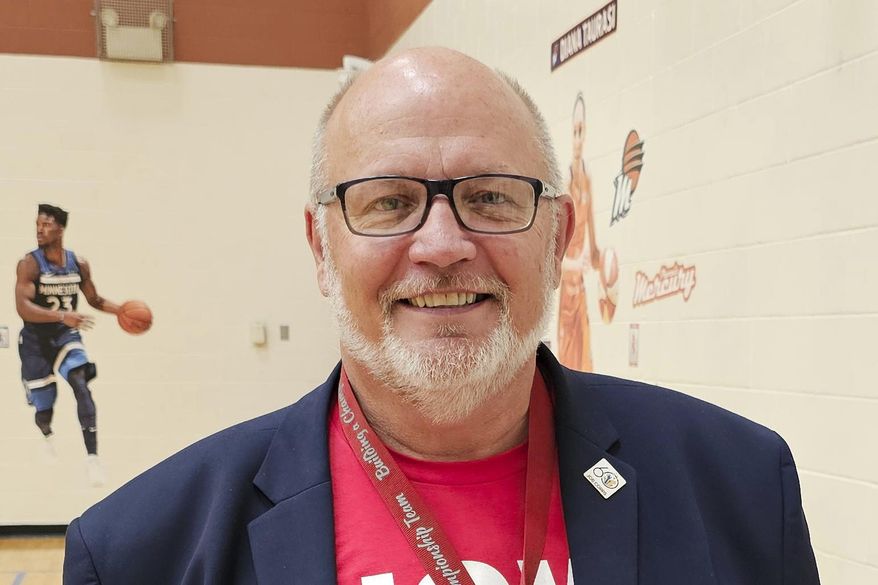 Tom Ross, mayor of Minot, N.D., one of North Dakota's largest cities, is photographed in August 2024. On Tuesday, April 1, 2025, Ross resigned after an investigation into him mistakenly sending a lewd video to the city attorney. (Minot Daily News via AP)