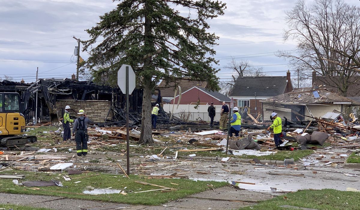 NextImg:Detroit-area house explodes, blasting man to the front lawn
