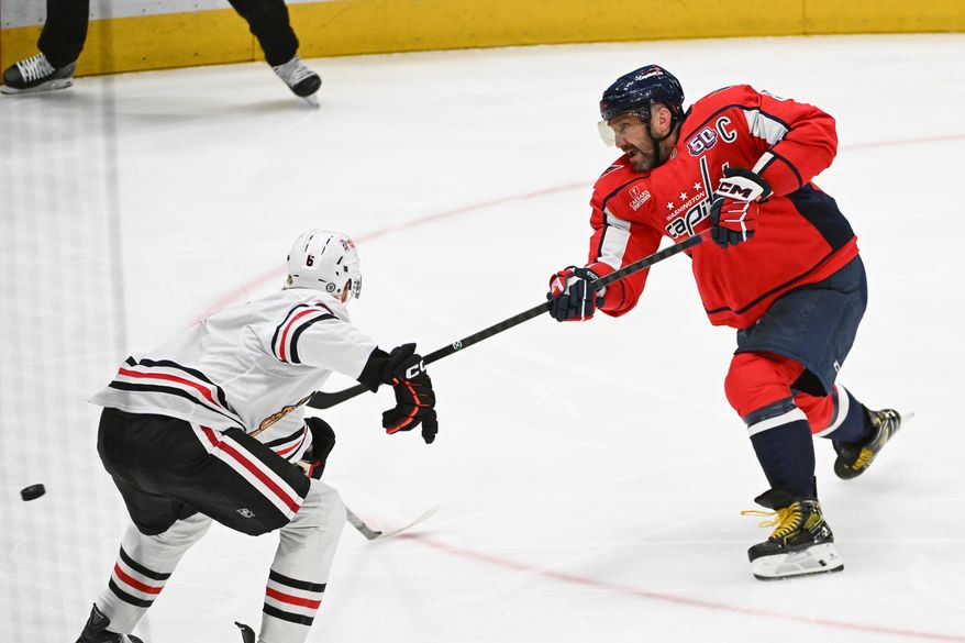 Washington Capitals left wing Alex Ovechkin (8) scoring goal number 893 during the first period of an NHL game against the Chicago Blackhawks at Capital One Arena in Washington D.C., April 4, 2025. (Photo for the Washington Times)