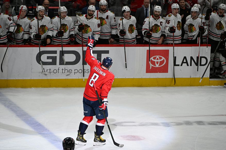 Washington Capitals left wing Alex Ovechkin (8) waiving to the crowd after scoring goal 894 during the third period of an NHL game against the Chicago Blackhawks at Capital One Arena in Washington D.C., April 4, 2025. (Photo for the Washington Times)