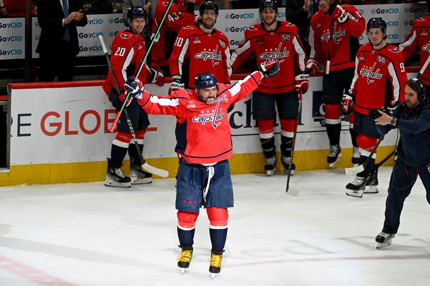 Washington Capitals left wing Alex Ovechkin (8) waving to the crowd after scoring goal 894 during the third period of an NHL game against the Chicago Blackhawks at Capital One Arena in Washington D.C., April 4, 2025. (Photo for the Washington Times)