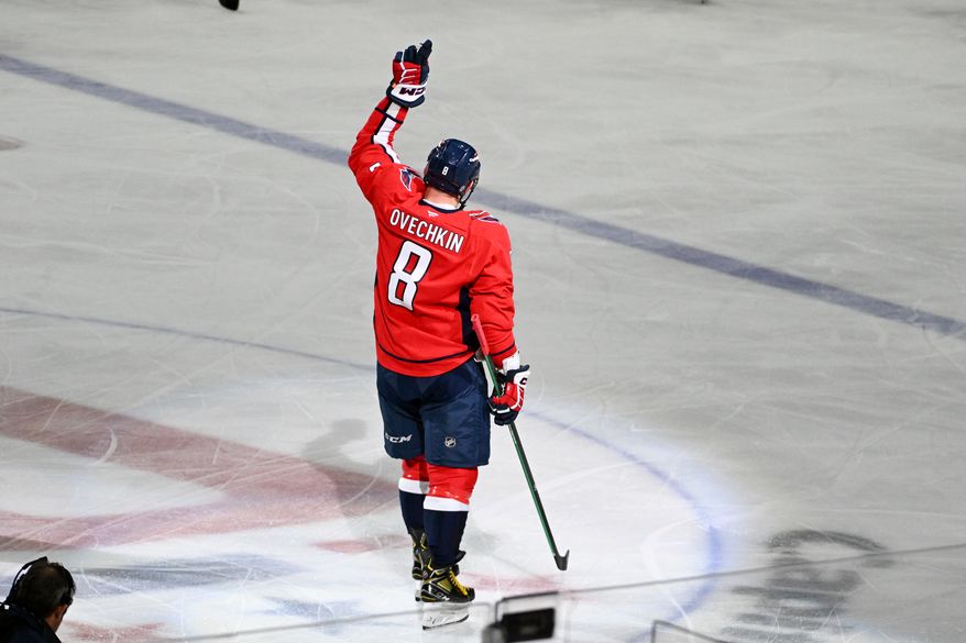 Washington Capitals left wing Alex Ovechkin (8) waving to the crowd after scoring goal 894 during the third period of an NHL game against the Chicago Blackhawks at Capital One Arena in Washington D.C., April 4, 2025. (Photo for the Washington Times)