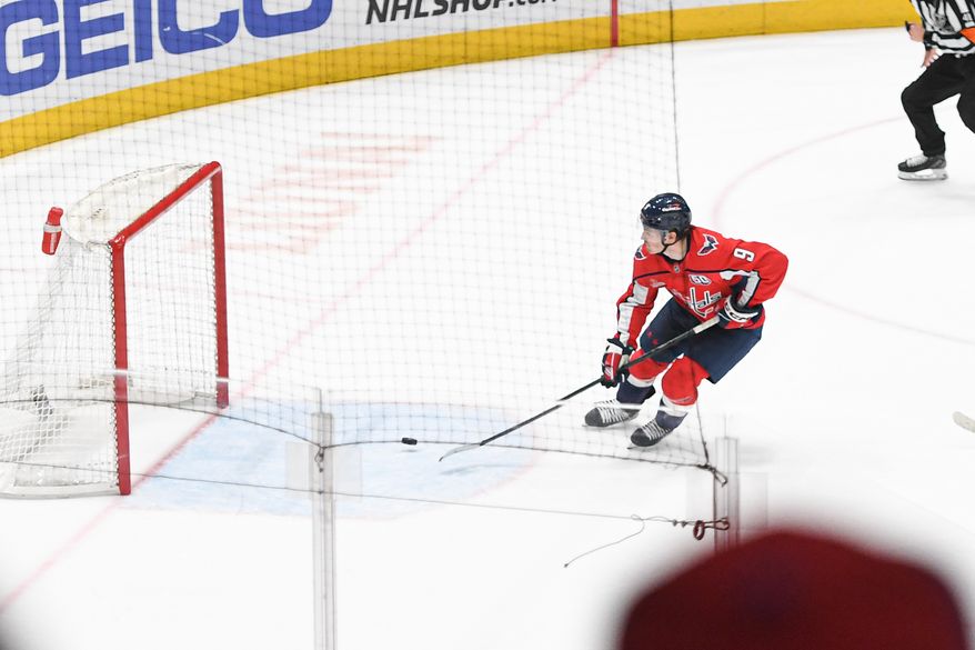 Washington Capitals forward Ryan Leonard (9) scoring an empty net goal for his first NHL goal during the third period of an NHL game against the Chicago Blackhawks at Capital One Arena in Washington D.C., April 4, 2025. (Photo for the Washington Times)