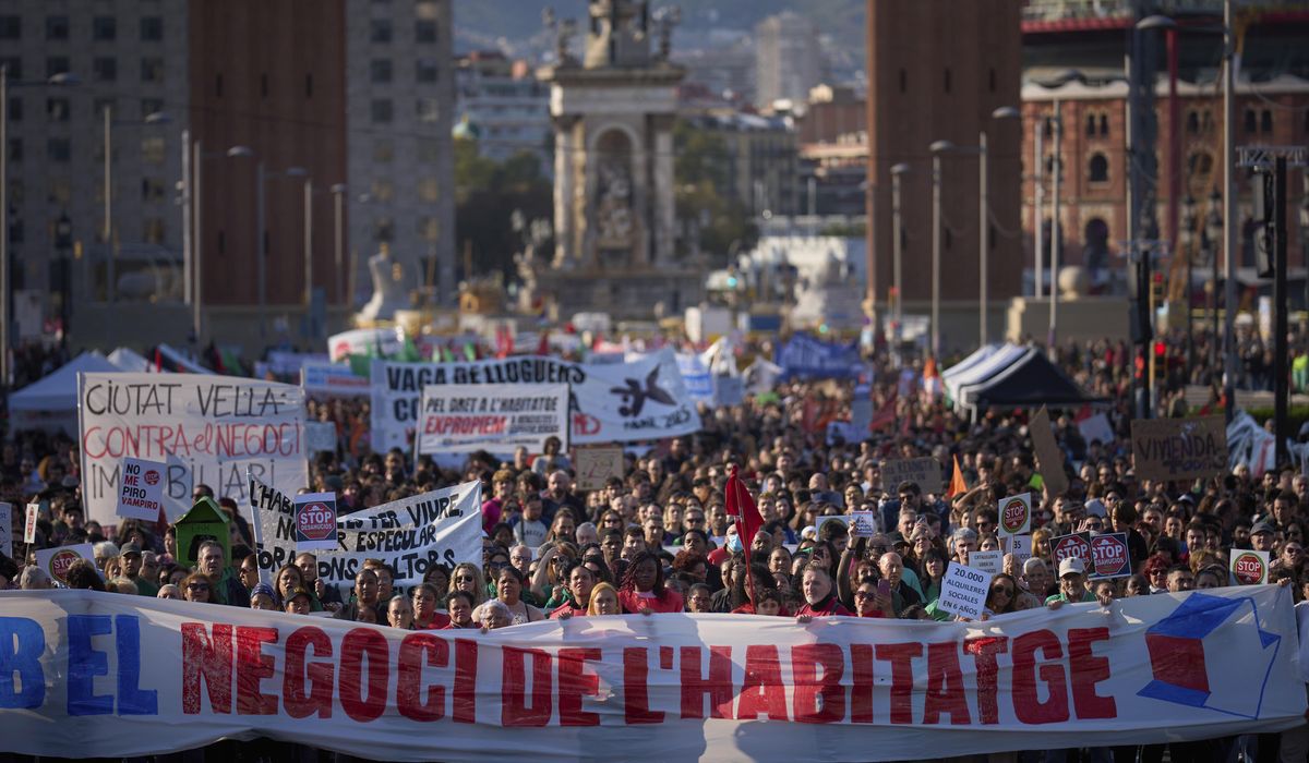 NextImg:Across Spain, tens of thousands march to protest the growing housing crisis