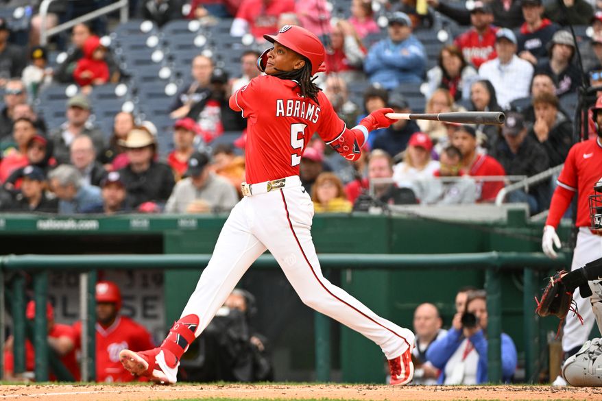 Washington Nationals shortstop C.J. Abrams (5) hitting a sacrifice fly and driving in Paul DeJong during the second inning of an MLB game against the Arizona Diamondbacks at Nationals Park in Washington D.C., April 6, 2025. (Photo by All-Pro Reels for Washington Times Sports)