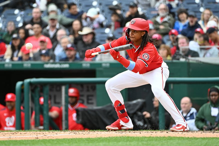 Washington Nationals shortstop C.J. Abrams (5) laying down a sacrifice bunt during the fourth inning of an MLB game against the Arizona Diamondbacks at Nationals Park in Washington D.C., April 6, 2025. (Photo by All-Pro Reels for Washington Times Sports)