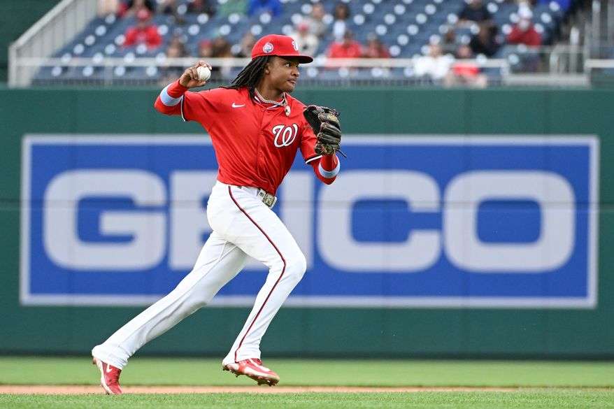 Washington Nationals shortstop C.J. Abrams (5) making the throw to first after fielding a ground ball off the bat of Arizona Diamondbacks shortstop Geraldo Perdomo (2) during the seventh inningof an MLB game at Nationals Park in Washington D.C., April 6, 2025. (Photo by All-Pro Reels for Washington Times Sports)