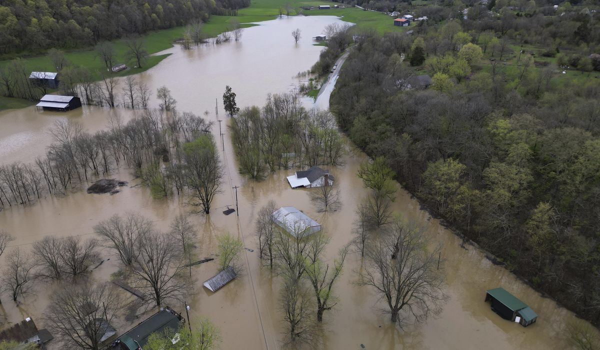 NextImg:Swollen rivers flood towns in U.S. South after dayslong deluge of rain