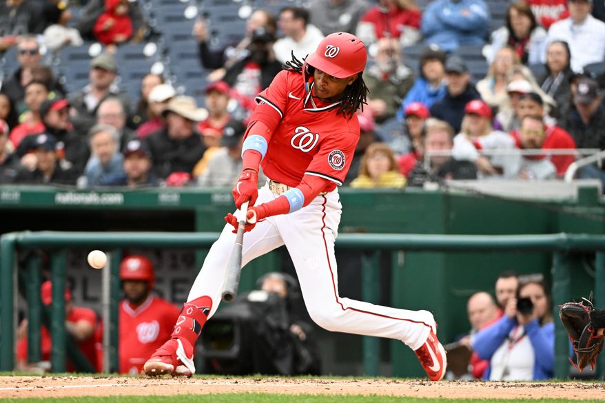 Washington Nationals shortstop C.J. Abrams (5) hitting a sacrifice fly and driving in Paul DeJong during the second inning of an MLB game against the Arizona Diamondbacks at Nationals Park in Washington D.C., April 6, 2025. (Photo by All-Pro Reels for Washington Times Sports)