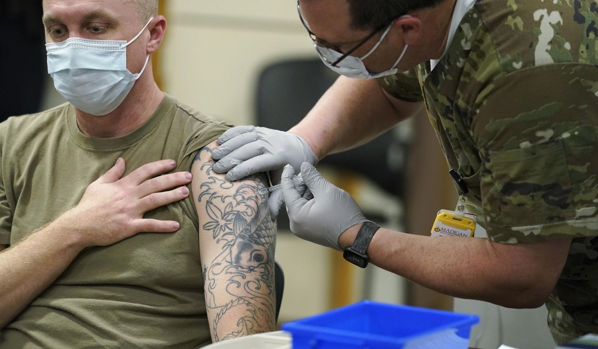 NextImg:Army reenlists nearly two dozen soldiers ousted for refusing COVID-19 vaccine
