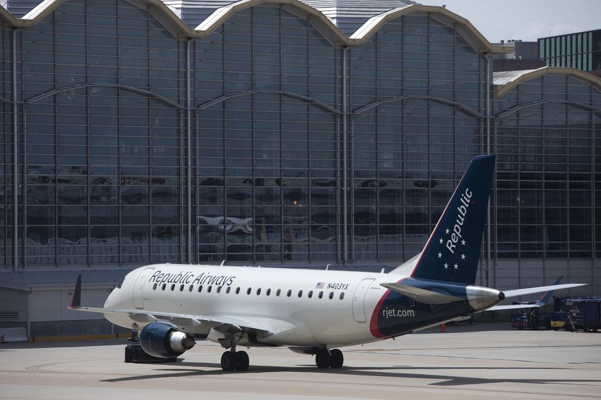 FILE - A Republic Airways jet is seen at Ronald Reagan Washington National Airport in Arlington, Va., June 2, 2021. (AP Photo/Jenny Kane, File)