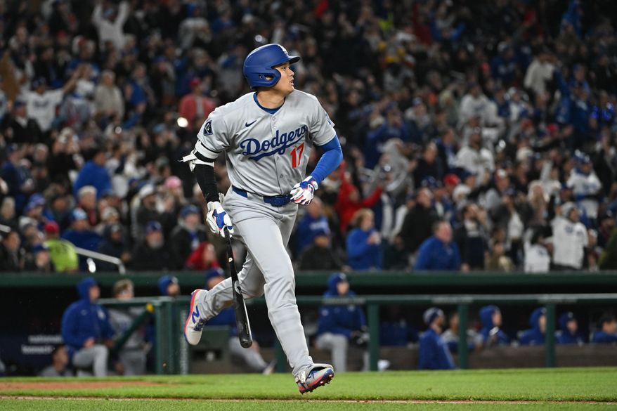 Los Angeles Dodgers designated hitter Shohei Ohtani (17) running to first after hitting a triple during the fifth inning of an MLB game against the Washington Nationals at Nationals Park in Washington D.C., April 7, 2025. (Photo by All-Pro Reels for Washington Times Sports)