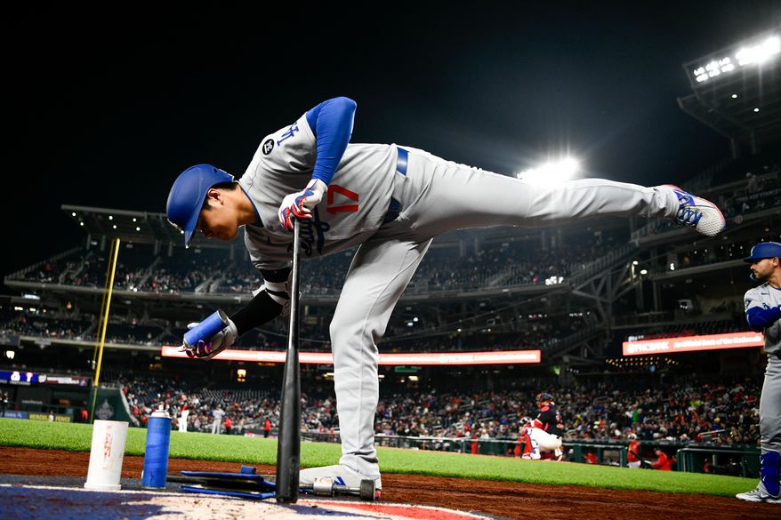 Los Angeles Dodgers designated hitter Shohei Ohtani (17) in the on deck circle during the eighth inning of an MLB game against the Washington Nationals at Nationals Park in Washington D.C., April 7, 2025. (Photo by All-Pro Reels for Washington Times Sports)