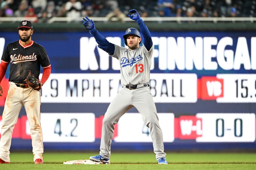 Los Angeles Dodgers third baseman Max Muncy (13) standing on second base after hitting a double during the ninth inning of an MLB game against the Washington Nationals at Nationals Park in Washington D.C., April 7, 2025. (Photo by All-Pro Reels for Washington Times Sports)