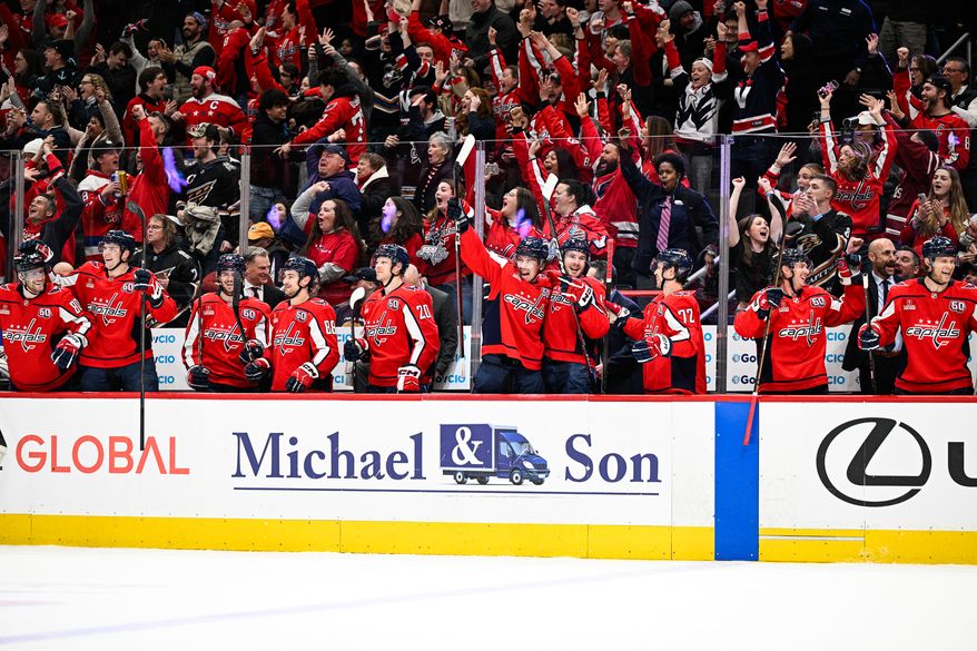 Washington Capitals center Dylan Strome (17) and teammates celebrate after left wing Alex Ovechkin (8) scored his 886th career goal during the third period against the Seattle Kraken at Capital One Arena, Washington, D.C., March 9, 2025. (Photo by Brian Murphy for the Washington Times)