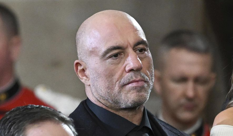 Joe Rogan stands for a benediction after President Donald Trump was sworn in during the 60th Presidential Inauguration in the Rotunda of the U.S. Capitol in Washington, Jan. 20, 2025. (Saul Loeb/Pool photo via AP, File)