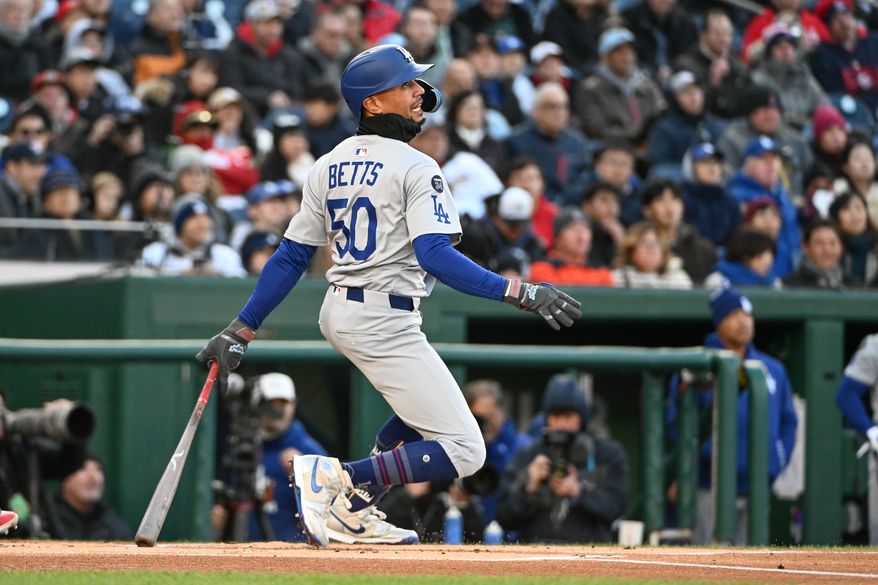 Los Angeles Dodgers shortstop Mookie Betts (50) hitting a single during the first inning of an MLB game against the Washington Nationals at Nationals Park in Washington D.C., April 8, 2025. (Photo by All-Pro Reels for Washington Times Sports)