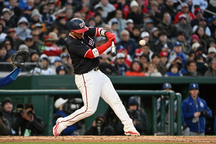 Washington Nationals catcher Keibert Ruiz (20) hitting a single during the second inning of an MLB game against the Los Angeles Dodgers at Nationals Park in Washington D.C., April 8, 2025. (Photo by All-Pro Reels for Washington Times Sports)
