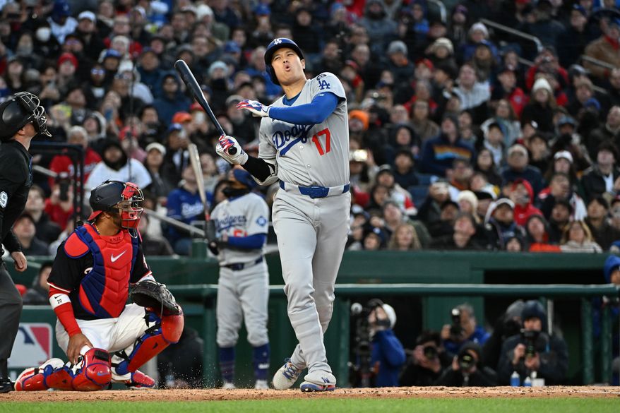 Los Angeles Dodgers designated hitter Shohei Ohtani (17) after a swing and a miss during the third inning of an MLB game against the Washington Nationals at Nationals Park in Washington D.C., April 8, 2025. (Photo by All-Pro Reels for Washington Times Sports)