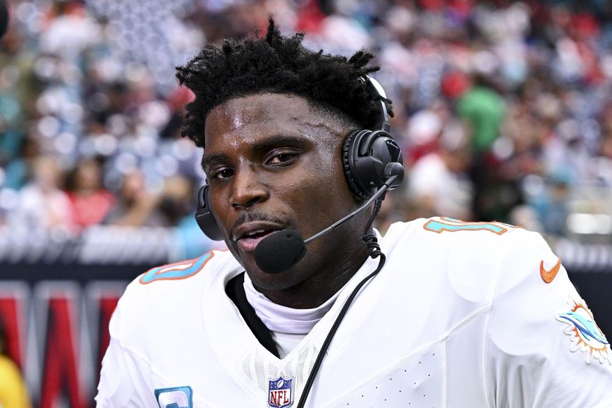 FILE - Miami Dolphins wide receiver Tyreek Hill speaks during a pre-game interview against the Houston Texans during an NFL football game, Sunday, Dec 15, 2024 in Houston. (AP Photo/Maria Lysaker,File)