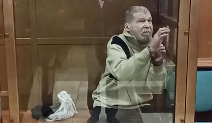 In this photo taken from video released by the Moscow City Court Press Service, Stephen Hubbard, a U.S. citizen accused of fighting as a mercenary in Ukraine against Russia stands in a glass cage during a court session in the Moscow City court in Moscow, Russia, Oct. 7, 2024. (Moscow City Court Press Service via AP, File)
