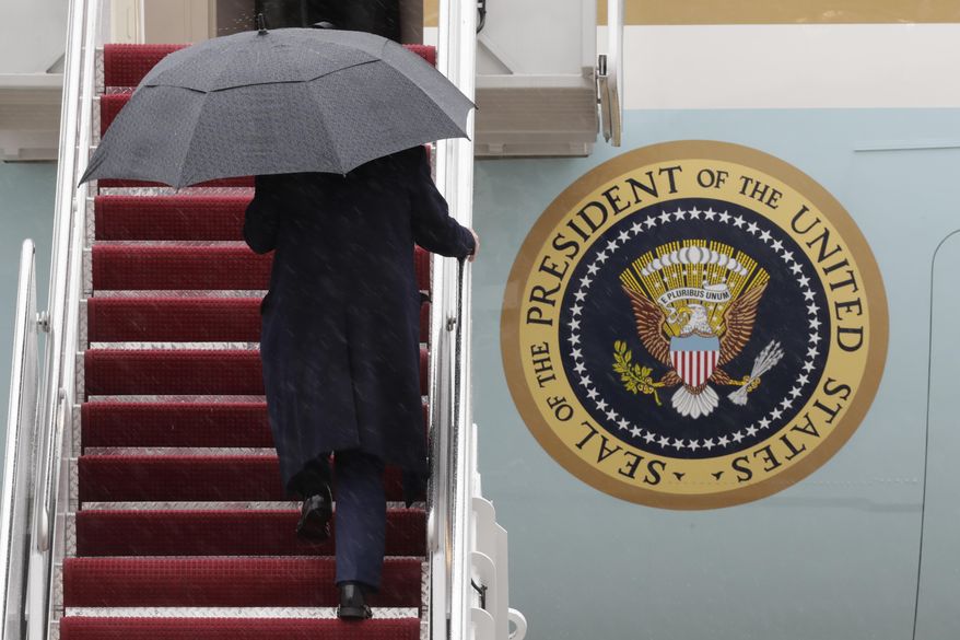 President Donald Trump walks up the stairs of Air Force One upon his arrival at Joint Base Andrews, Md., Friday, April 11, 2025. (AP Photo/Luis M. Alvarez)