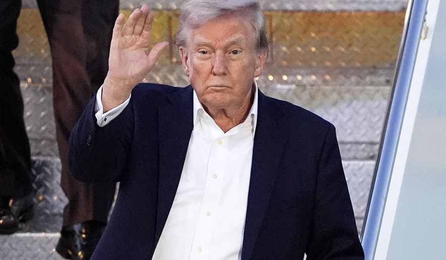 President Donald Trump arrives at Palm Beach International Airport, Friday, April 11, 2025, in West Palm Beach, Fla. (AP Photo/Manuel Balce Ceneta)
