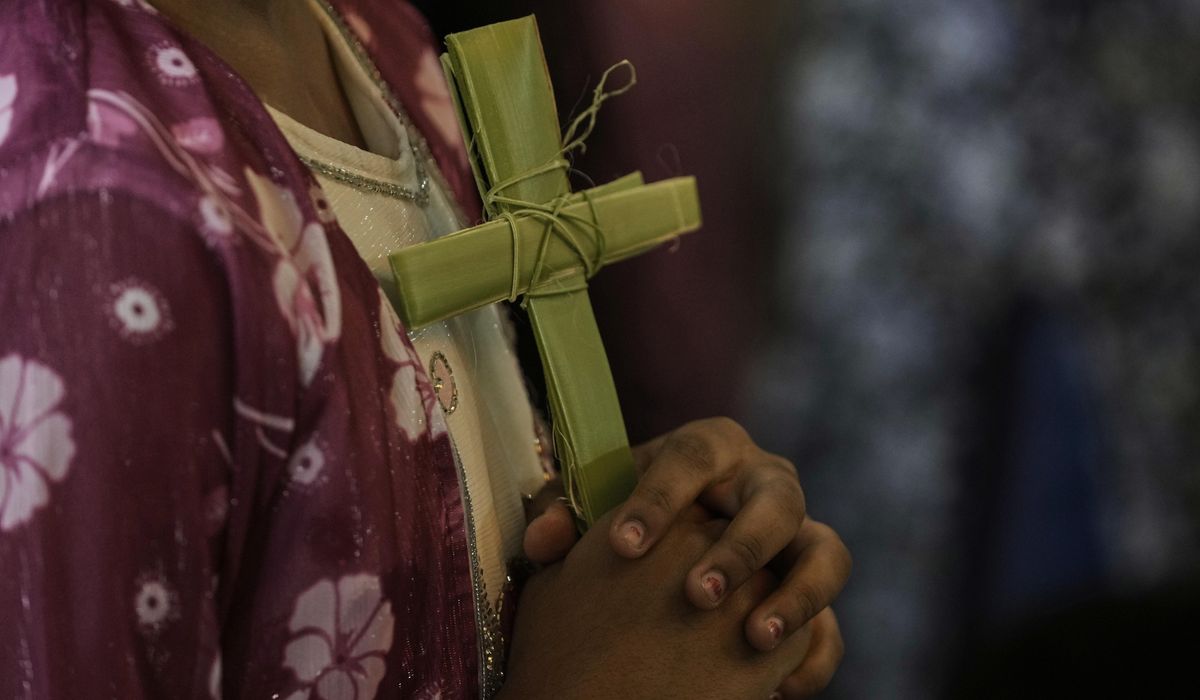 NextImg:France sees a record surge in conversions to Catholicism