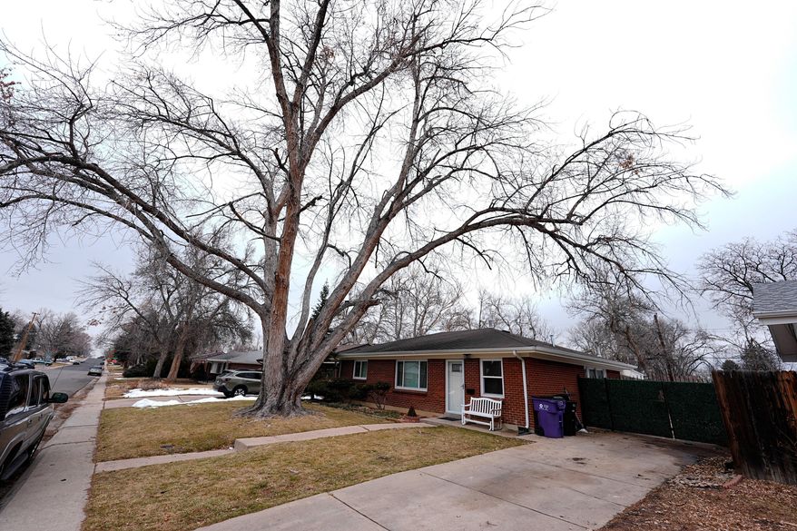 FILE - The residence where a former funeral home owner kept a deceased women's body in a hearse for two years as well as the remains of 30 cremated people is shown Friday, Feb. 16, 2024, in southwest Denver. (AP Photo/David Zalubowski, file)
