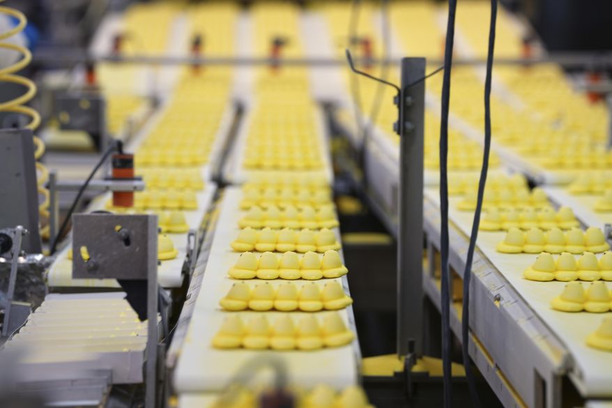 Peeps marshmallow treats move through the manufacturing process at the Just Born factory in Bethlehem, Pa., Thursday, April 10, 2025. (AP Photo/Matt Rourke)